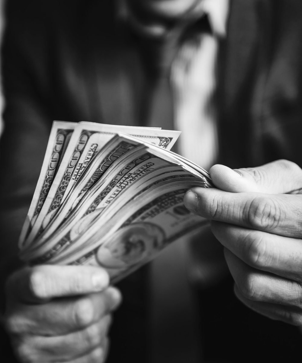 A person carrying a lot of cash